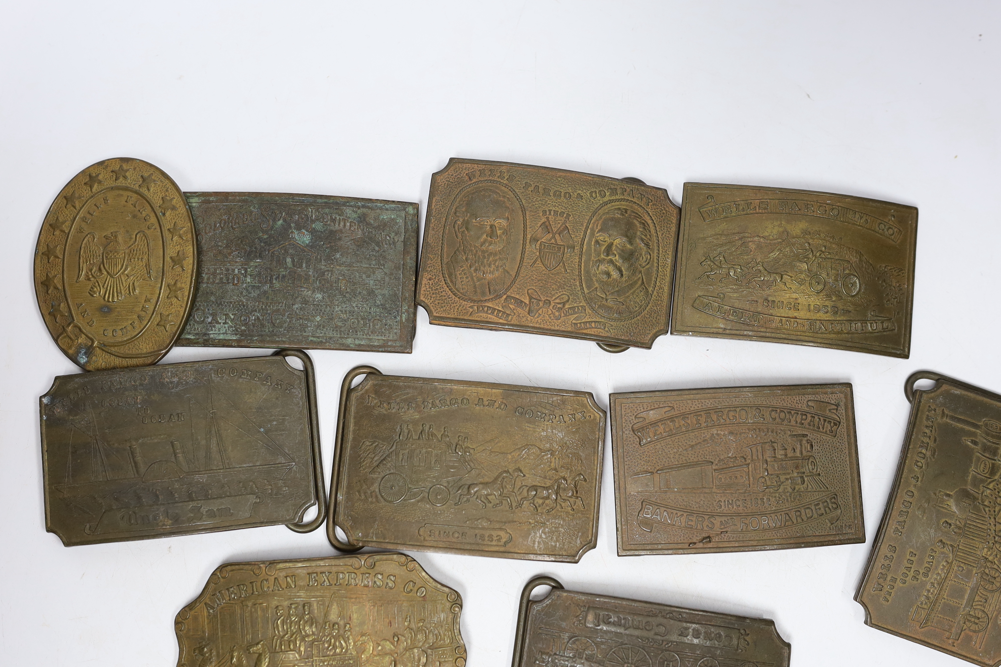 A collection of Wells Fargo and similar belt buckles, mostly by Tiffany & Co.